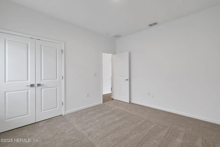 Spacious, unfurnished interior of a new home in TrailMark, St. Augustine (Image 19). Spacious, unfurnished interior of a new home in TrailMark, St. Augustine (Image 19).