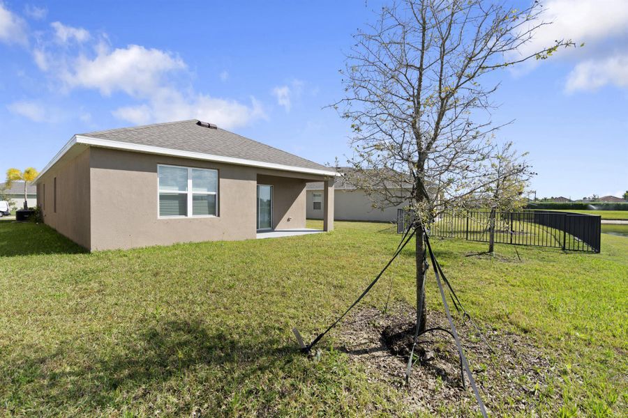 Exterior details and patio area of a home in Central Park 40s, Port St. Lucie (Image 20).