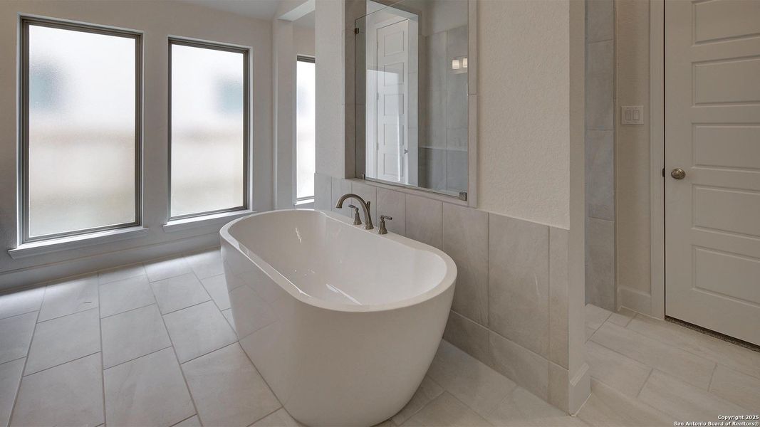 Furnished interior view inside a new home in Stevens Ranch 55', San Antonio (Image 4).