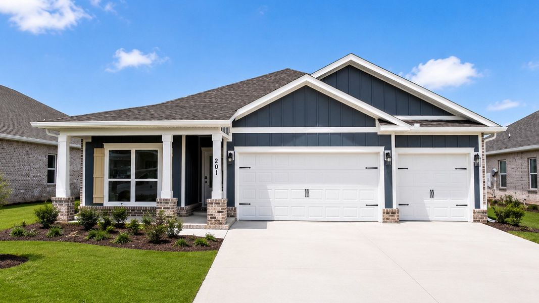 Front exterior of a new home in Owl's Head Farms, Freeport, FL, highlighting curb appeal (Image 1). Front exterior of a new home in Owl's Head Farms, Freeport, FL, highlighting curb appeal (Image 1).