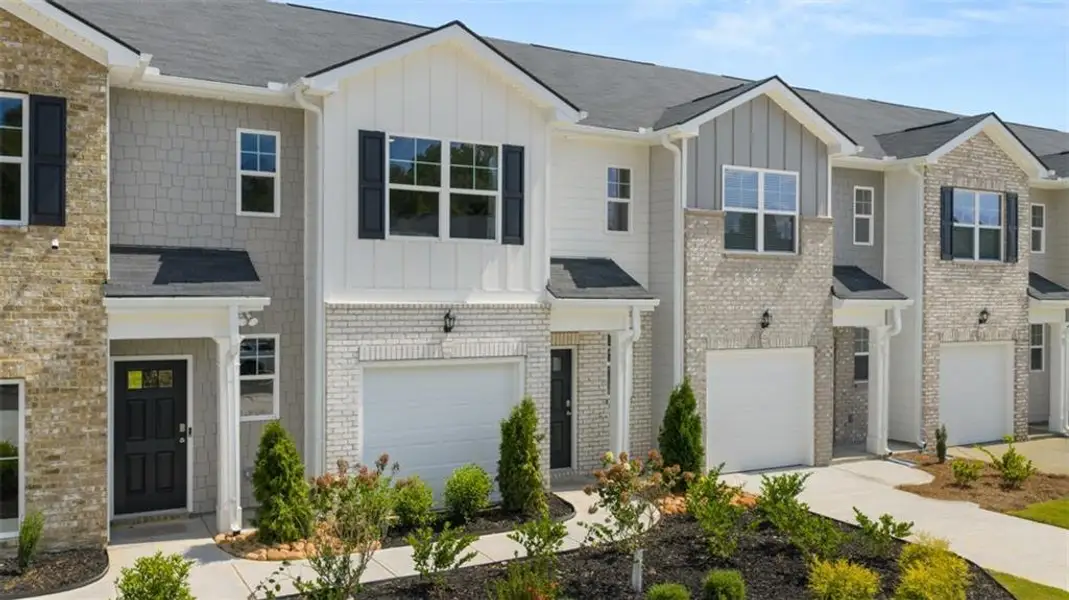 Front exterior of a new home in The Gables at Agricultural Village, Perry, GA, highlighting curb appeal (Image 25).