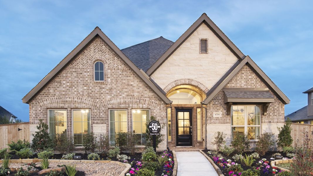 Front exterior of a new home in Candela, Richmond, TX, highlighting curb appeal (Image 33).