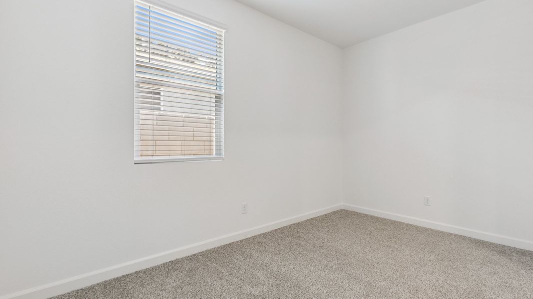 Spacious, unfurnished interior of a new home in Zanjero Pass, Waddell (Image 27).