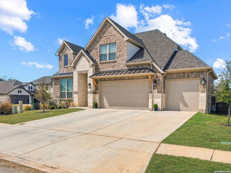 Front exterior of a new home in Corley Farms, Boerne, TX, highlighting curb appeal (Image 22).