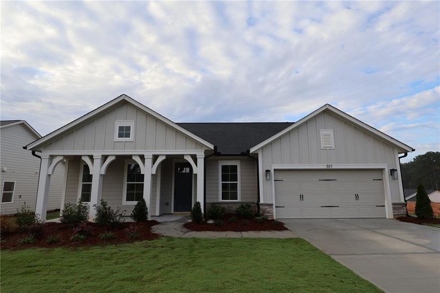 Front exterior of a home in the Old Mill Preserve community, located in Dallas, GA (Image 11).