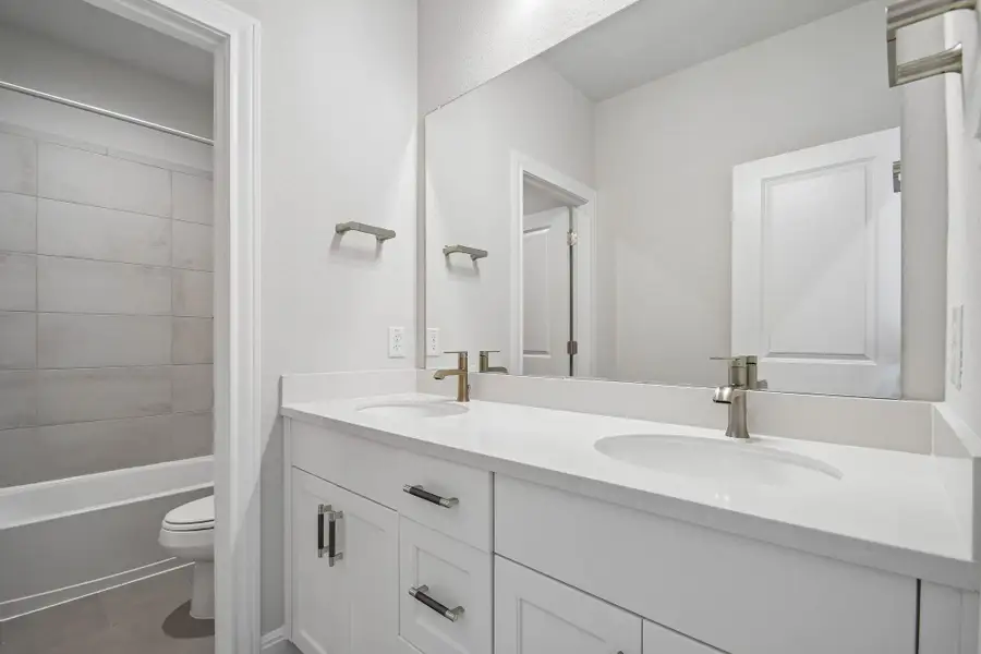 Furnished interior view inside a new home in 6 Creeks, Kyle (Image 12).