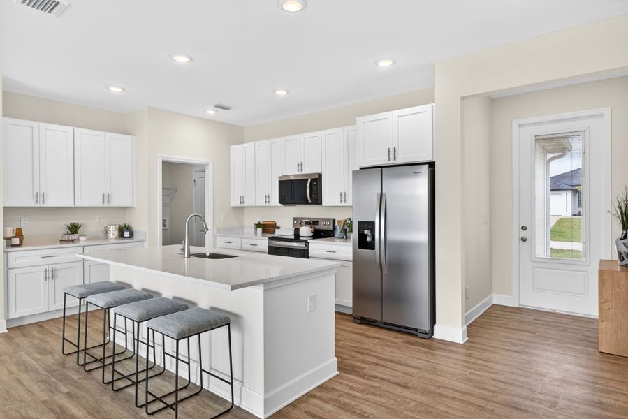 Representative furnished interior of a home built from the The Bluewater Cove by Sunlife Homes LLC in Cape Coral, Cape Coral (Image 15).