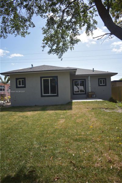 Front exterior of a new home in , Deerfield Beach, FL, highlighting curb appeal (Image 1).