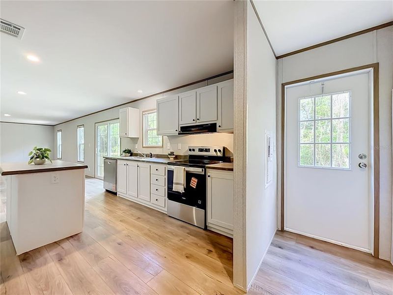 Furnished interior view inside a new home in , Satsuma (Image 15).
