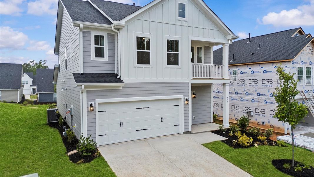 Front exterior of a new home in Pleasant Falls, Moore, SC, highlighting curb appeal (Image 18).