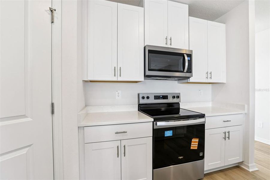 Furnished interior view inside a new home in Benton Hills - Classic Series, Brooksville (Image 8). Furnished interior view inside a new home in Benton Hills - Classic Series, Brooksville (Image 8).