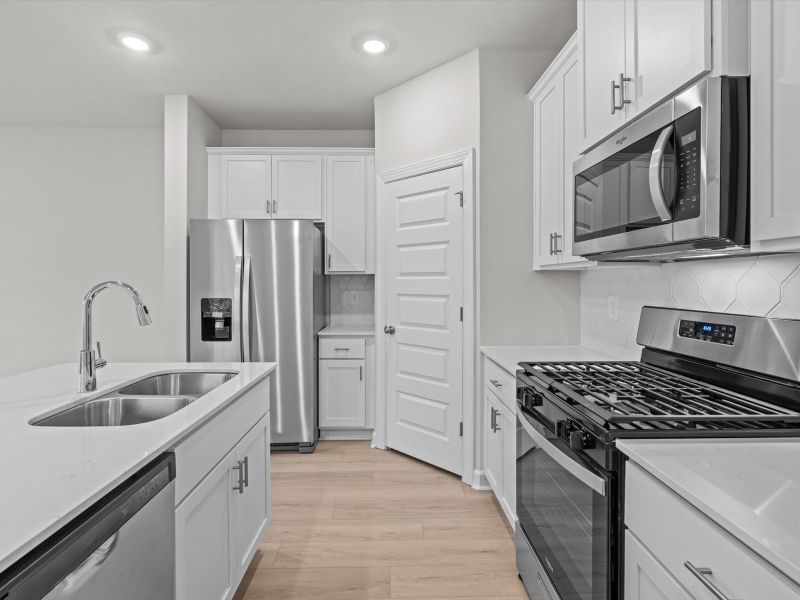 Furnished interior view inside a new home in Crossing at Abner Creek Townes, Greer (Image 6).