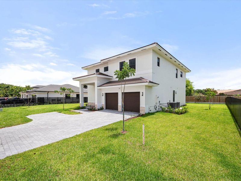 Front exterior of a new home in , Miami, FL, highlighting curb appeal (Image 20).