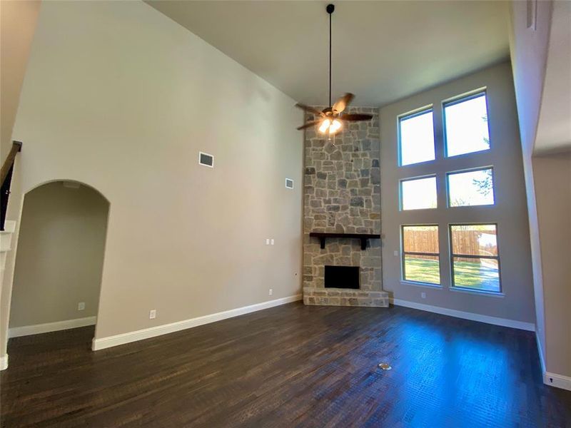 Impressive cathedral ceilings in great room with a wall of windows!