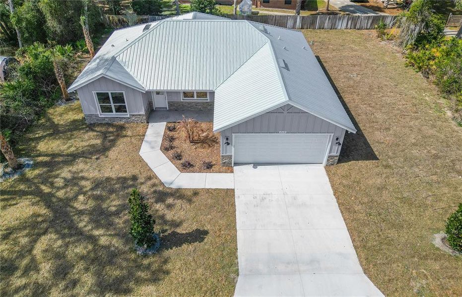 Front exterior of a new home in , Deland, FL, highlighting curb appeal (Image 17).