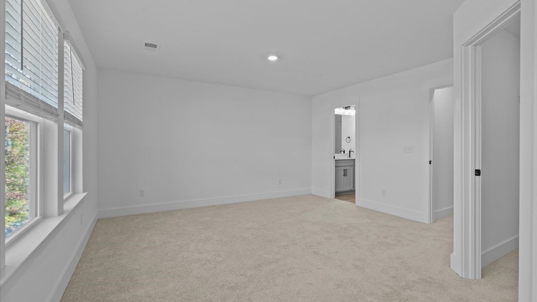 Superior layout with private, modern primary suite in this leading DRB Homes design