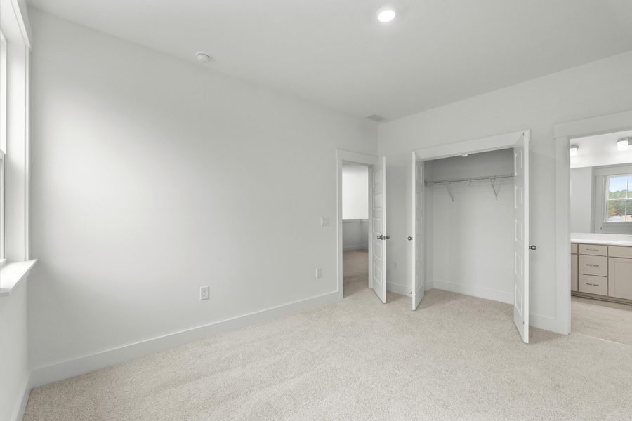 Spacious, unfurnished interior of a new home in Long Bay Golf Club, Longs (Image 34).