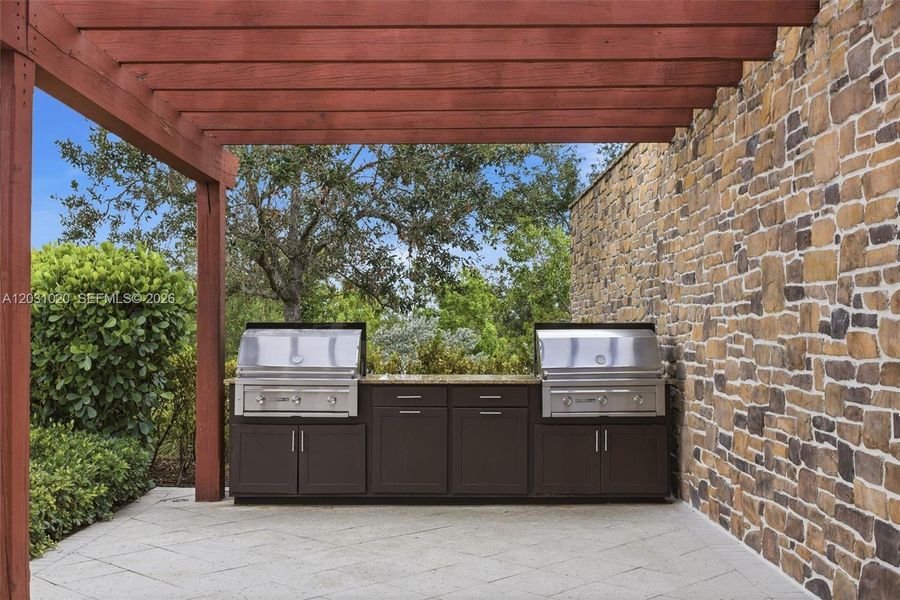 Exterior details and patio area of a home in Arden, Loxahatchee (Image 24).
