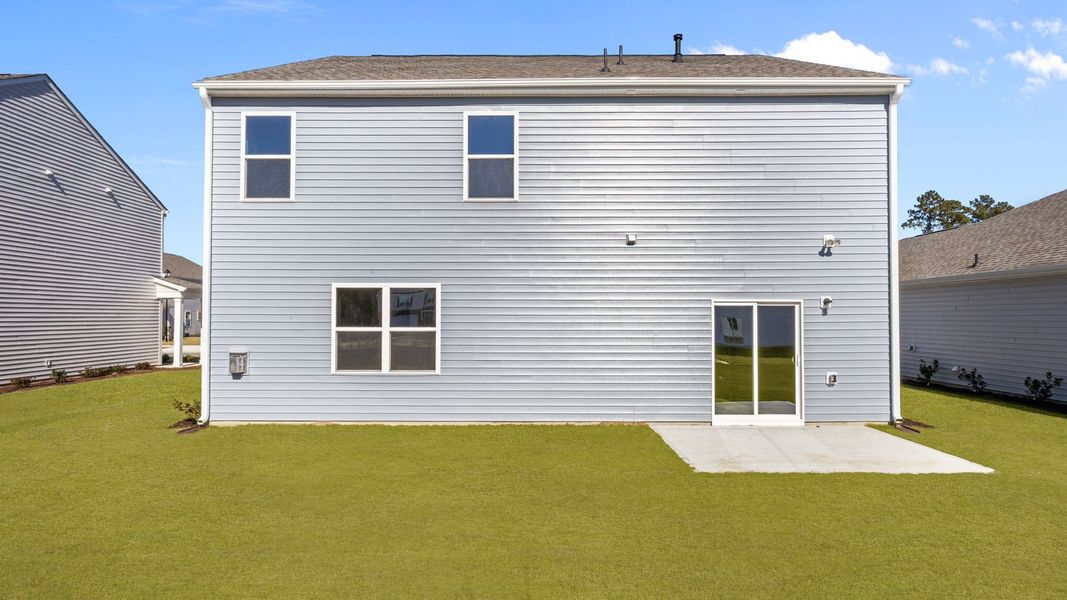 Exterior details and patio area of a home in West New Bern, New Bern (Image 23).