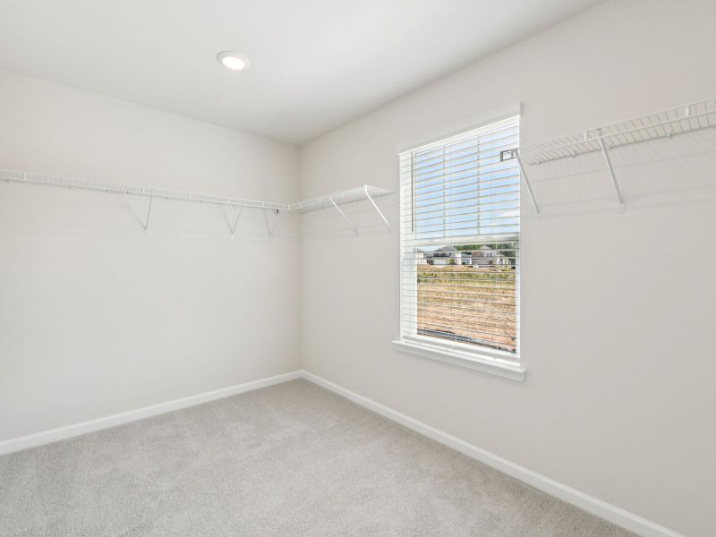 Spacious, unfurnished interior of a new home in Vines at Mill Creek - Estate Series, Braselton (Image 18).
