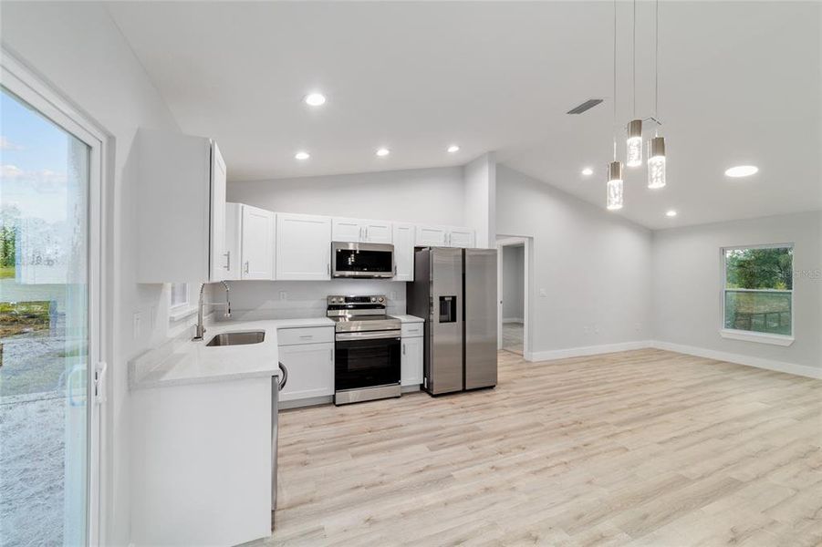 Furnished interior view inside a new home in , Dunnellon (Image 5).