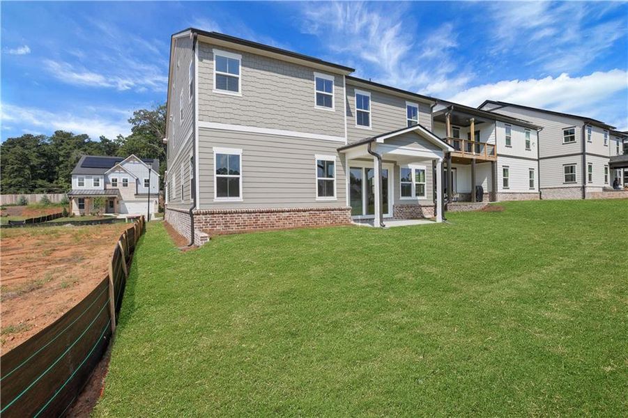 Exterior details and patio area of a home in Wisteria at GreenHouse, Marietta (Image 3).
