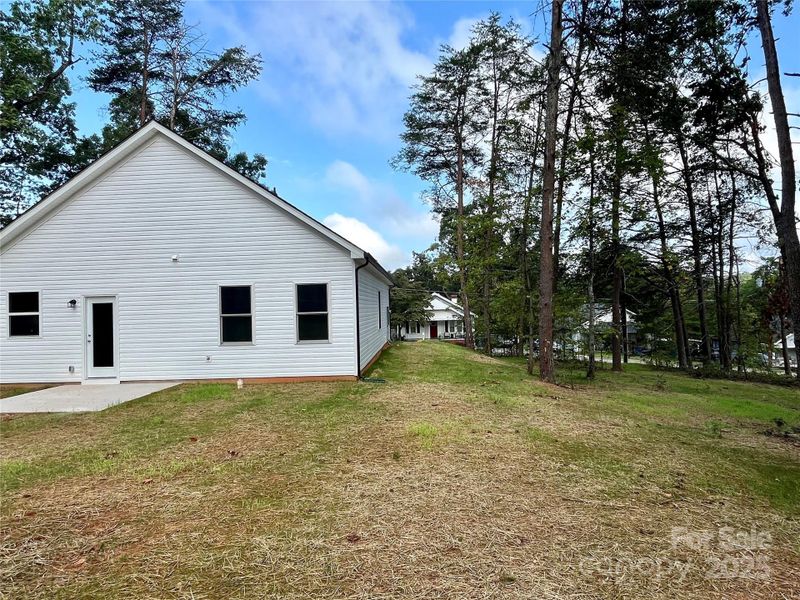 Front exterior of a new home in , Granite Falls, NC, highlighting curb appeal (Image 1).