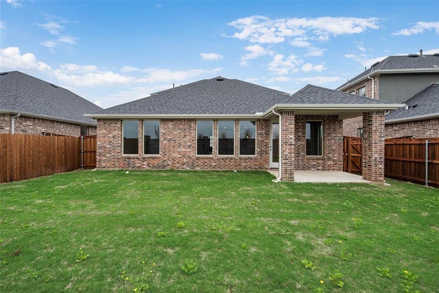 Front exterior of a new home in Sutton Fields, Celina, TX, highlighting curb appeal (Image 1). Front exterior of a new home in Sutton Fields, Celina, TX, highlighting curb appeal (Image 1).