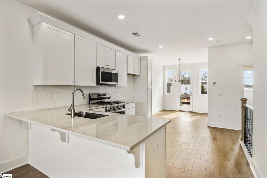 Furnished interior view inside a new home in Renaissance Place, Greenville (Image 6).