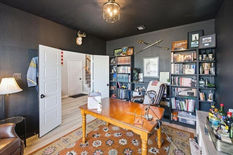 Office space featuring wood finished floors Office space featuring wood finished floors