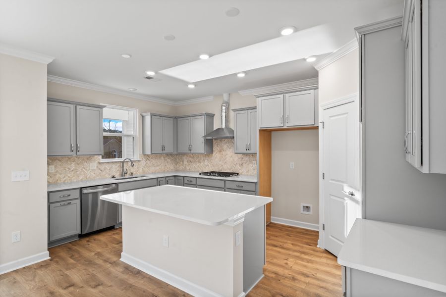 Representative furnished interior of a home built from the The Sunset Cove by Chesapeake Homes in Bridgewater - Shorehaven Village, Little River (Image 4).