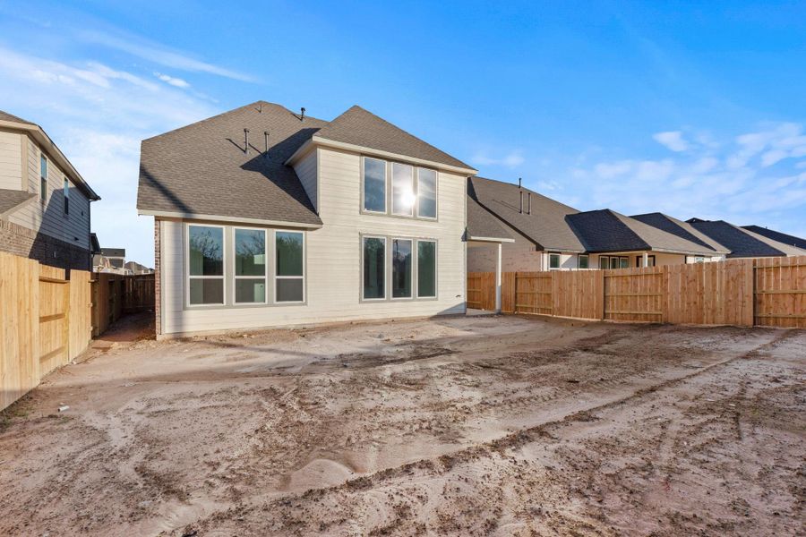 This backyard is perfect for family gatherings, social events, or simply unwinding in the fresh air. This backyard is perfect for family gatherings, social events, or simply unwinding in the fresh air.