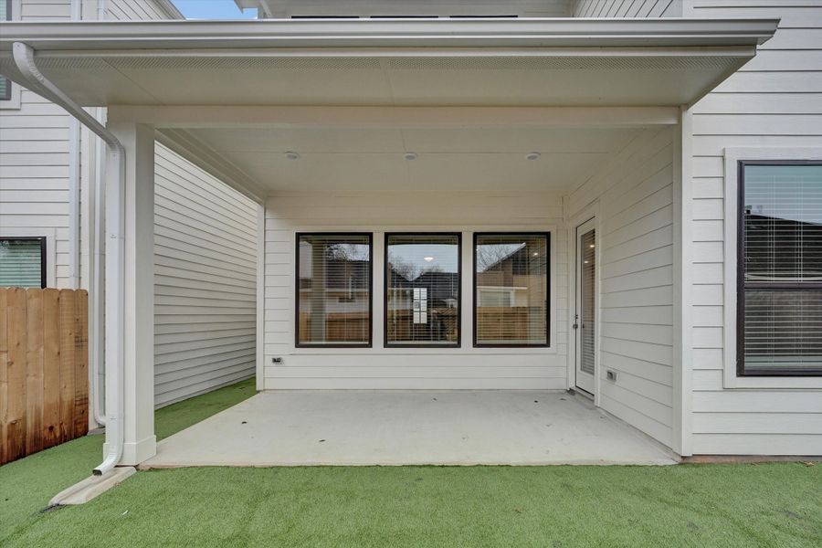 Exterior details and patio area of a home in Summer Place  35', Montgomery (Image 31).