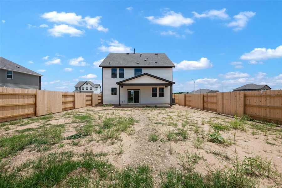 Exterior details and patio area of a home in Patterson Ranch, Georgetown (Image 15).
