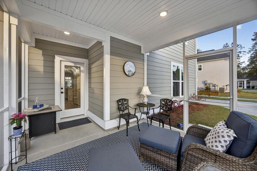 Exterior details and patio area of a home in Pineland Village, Summerville (Image 4).