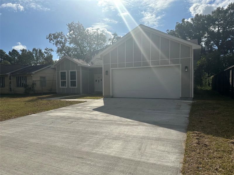 Front exterior of a new home in , Houston, TX, highlighting curb appeal (Image 6).