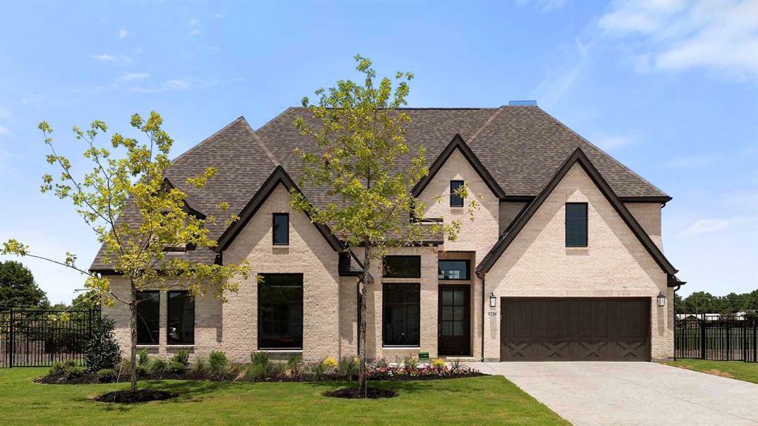 Front exterior of a new home in Terraces 82'/100', Rockwall, TX, highlighting curb appeal (Image 1).
