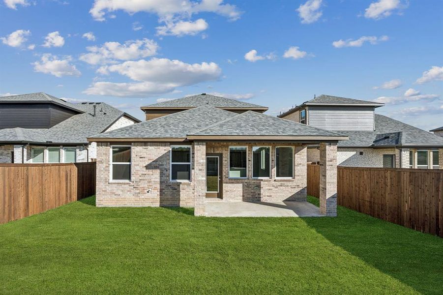 Exterior details and patio area of a home in Santorini, Seagoville (Image 2).