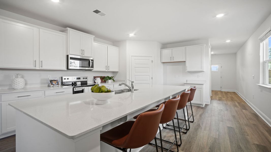 Representative furnished interior of a home built from the Hemingway-Exp by D.R. Horton in The Lakes at North Glynn, Brunswick (Image 7).