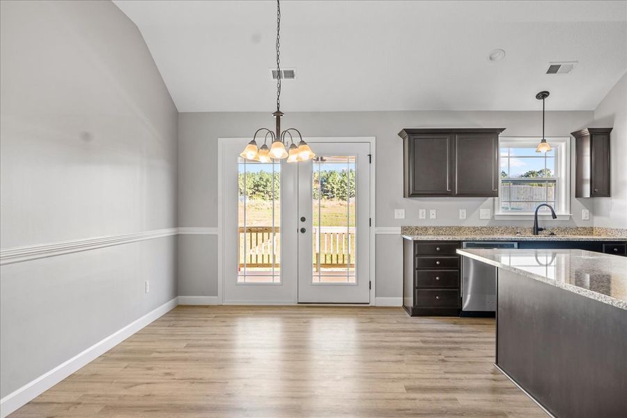Representative furnished interior of a home built from the Whitney by Enchanted Homes in Lonesome Dove, San Antonio (Image 13).