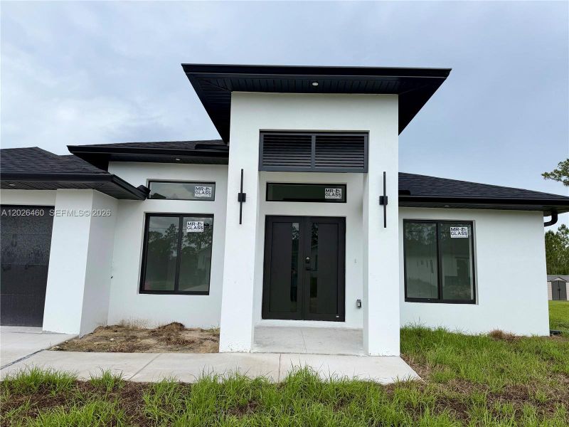 Exterior details and patio area of a home in , Lehigh Acres (Image 29).