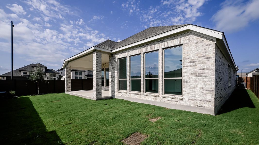 Exterior details and patio area of a home in Juniper Springs, Lockhart (Image 3).