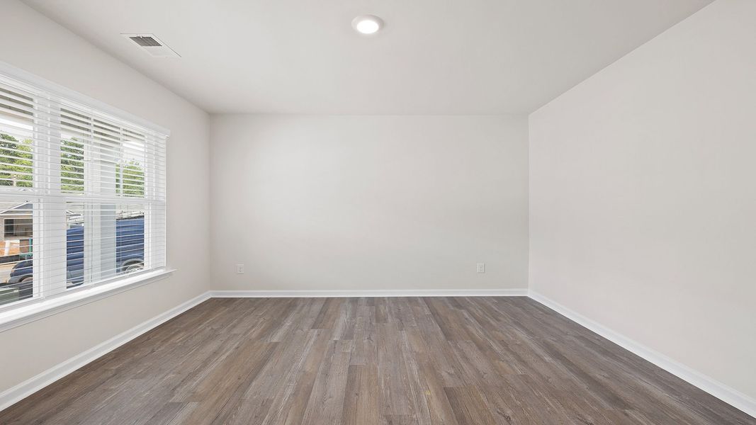 Spacious, unfurnished interior of a new home in Bentley Park, Greenwood (Image 14).