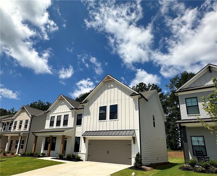 Front exterior of a new home in Summerlin, Winder, GA, highlighting curb appeal (Image 25).