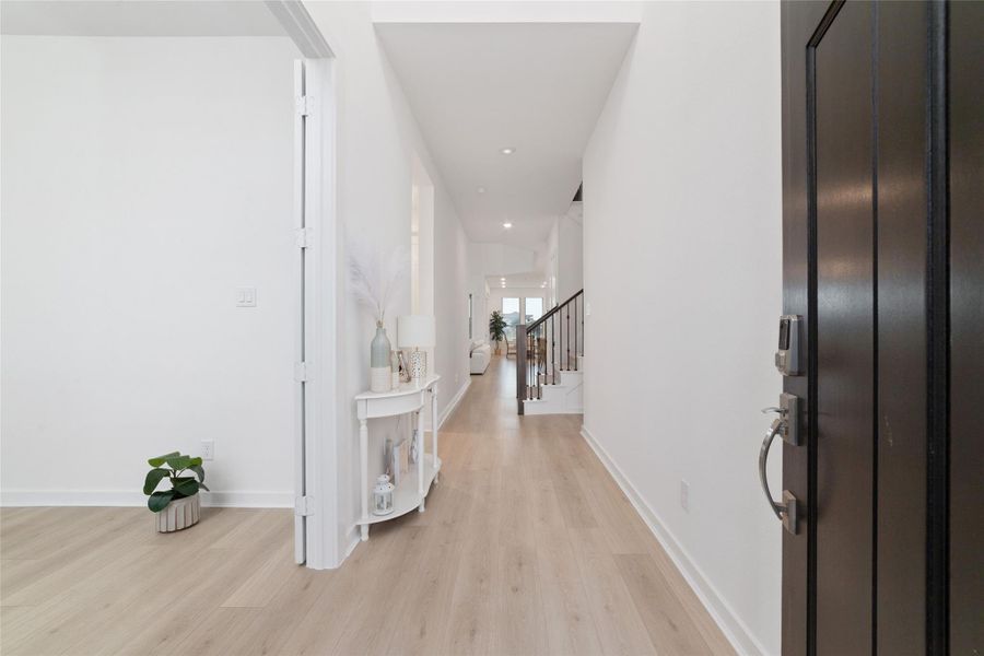 Furnished interior view inside a new home in Elyson, Katy (Image 40).