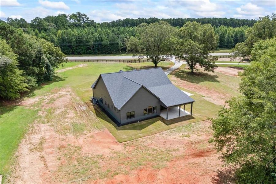 Front exterior of a new home in , Monroe, GA, highlighting curb appeal (Image 31).