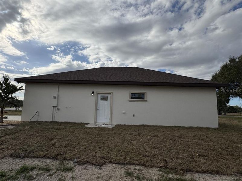 Exterior details and patio area of a home in , Okeechobee (Image 29).