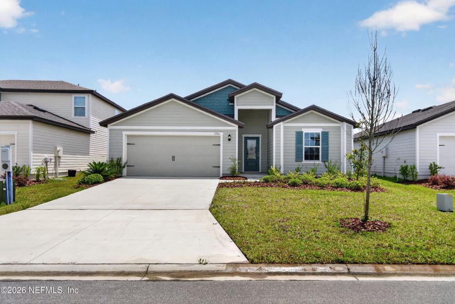 Front exterior of a new home in , Jacksonville, FL, highlighting curb appeal (Image 17).