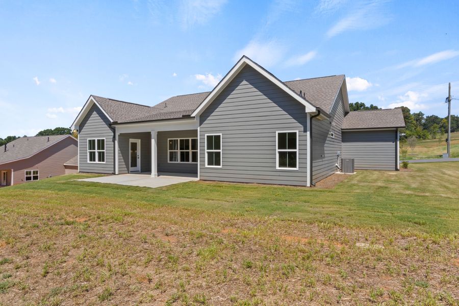 Exterior details and patio area of a home in Cherokee Knoll, Williamston (Image 18). Exterior details and patio area of a home in Cherokee Knoll, Williamston (Image 18).