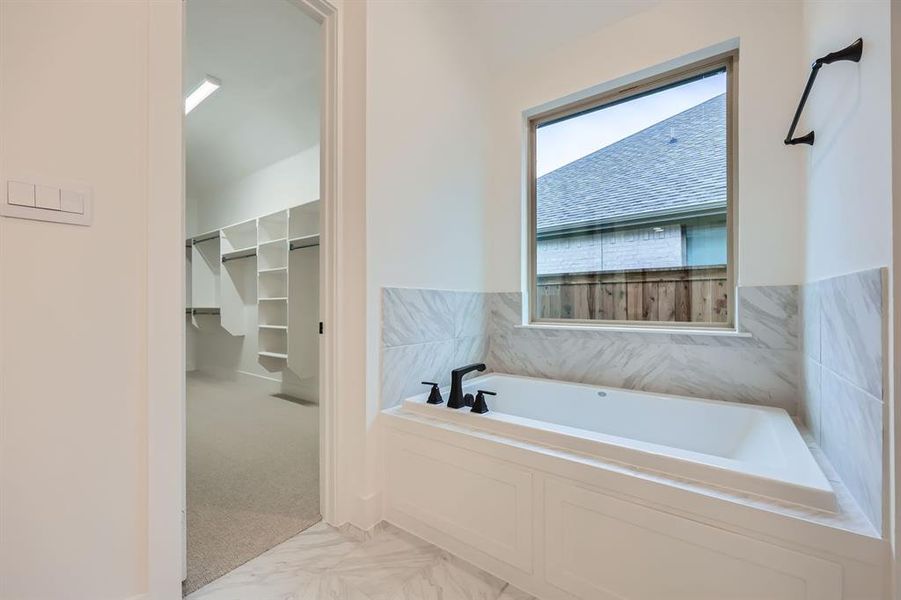 Bathroom featuring a bathtub